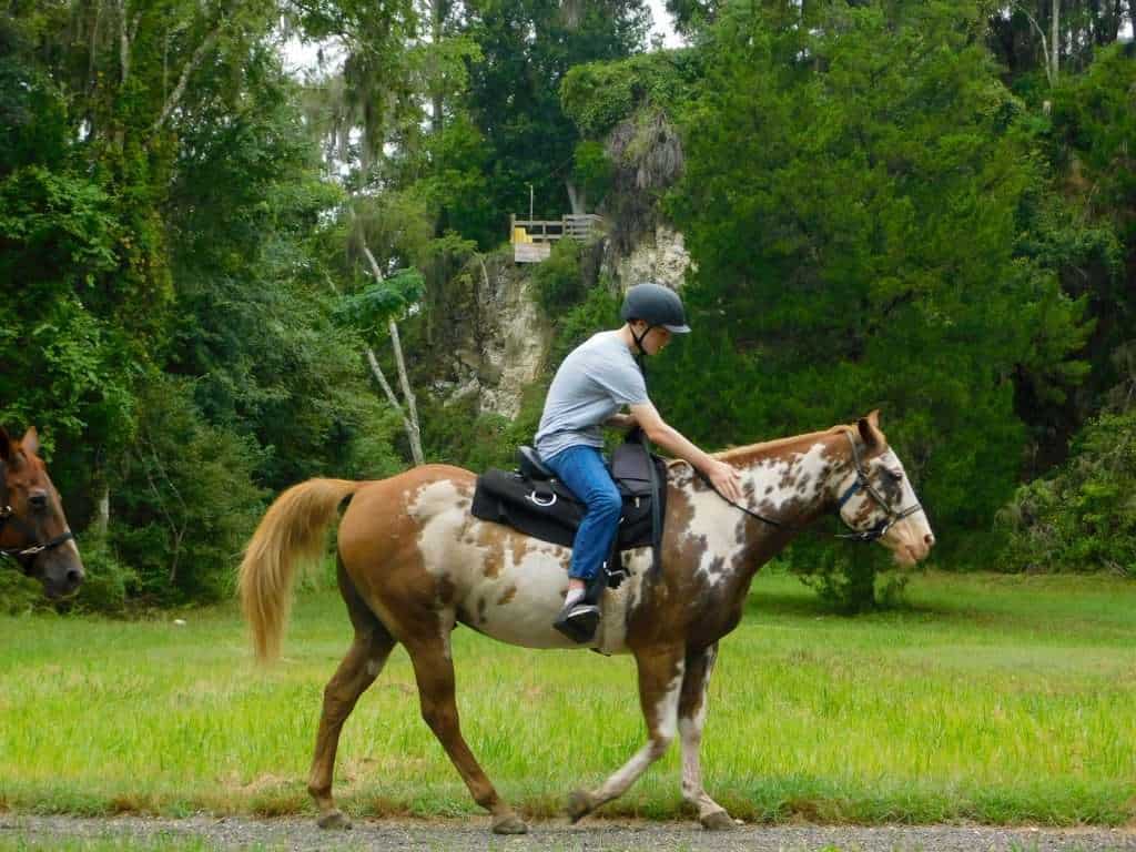 boy on horse, one of the best things to do in Ocala with teenagers