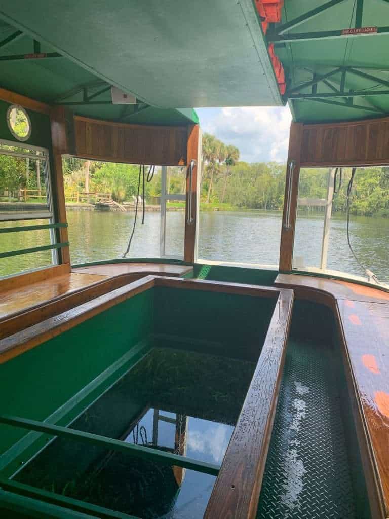 seating area inside the glass bottom boat