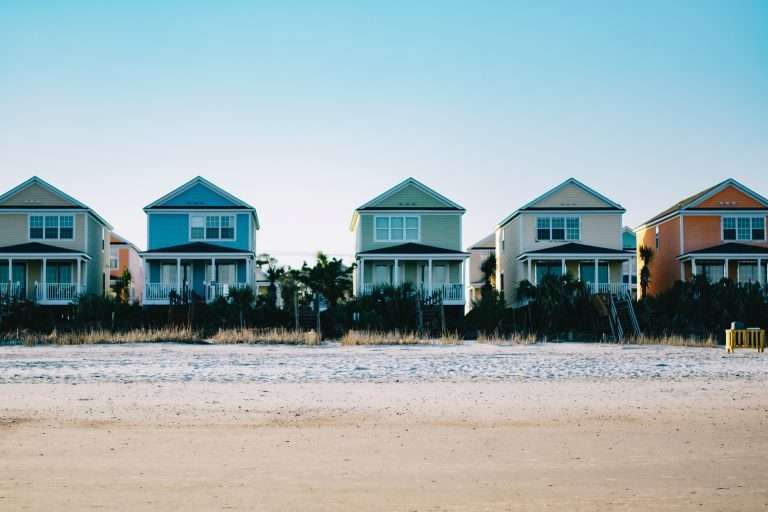 Arirbnb vs VRBO how to decide which is best five assorted-color 2-storey houses